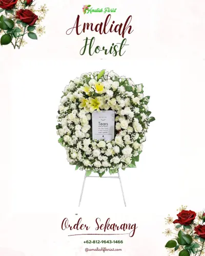 Krans Bunga Duka Cita di Tuak Daun Merah